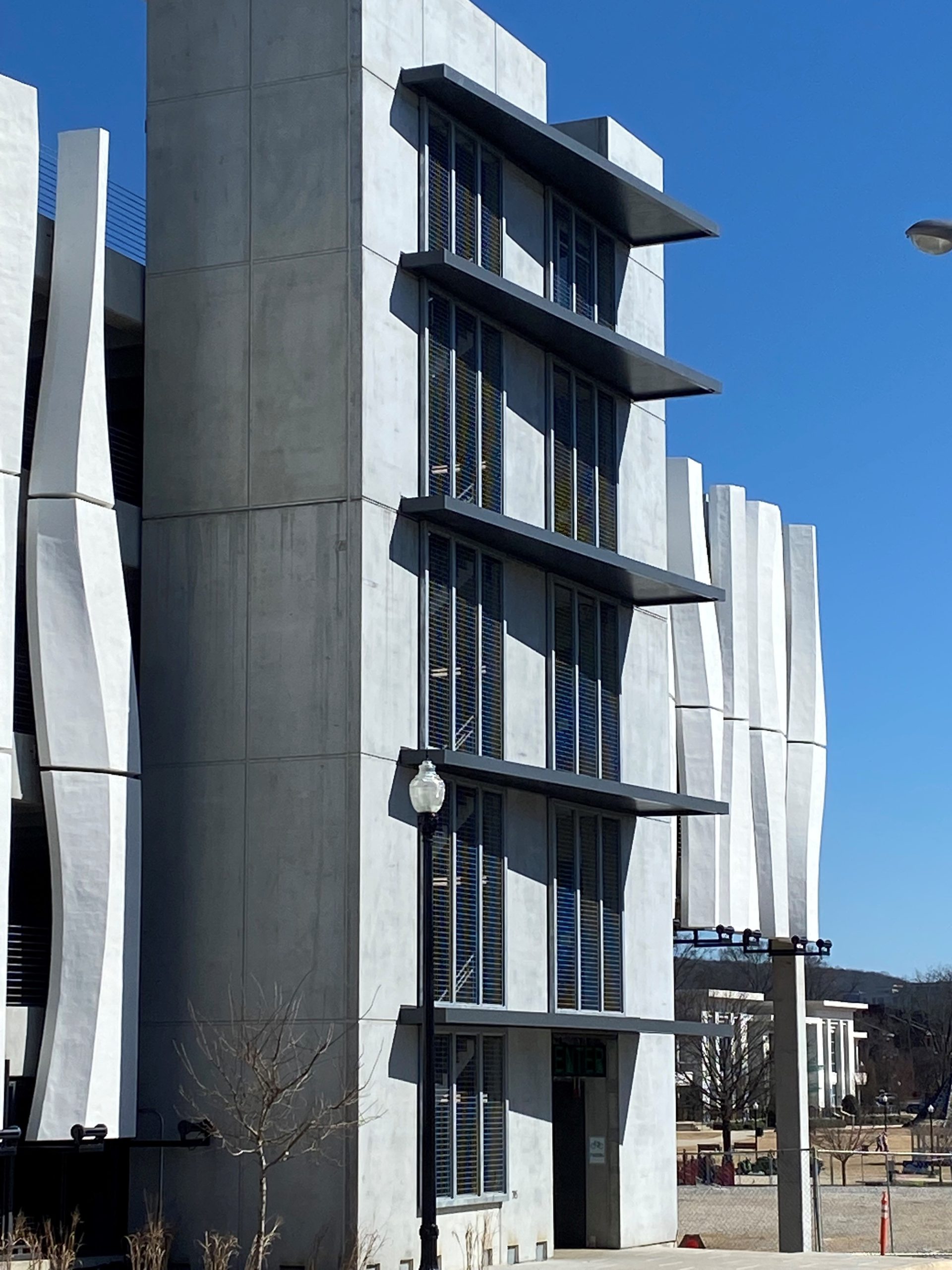 black cantilevered rod supported canopies
